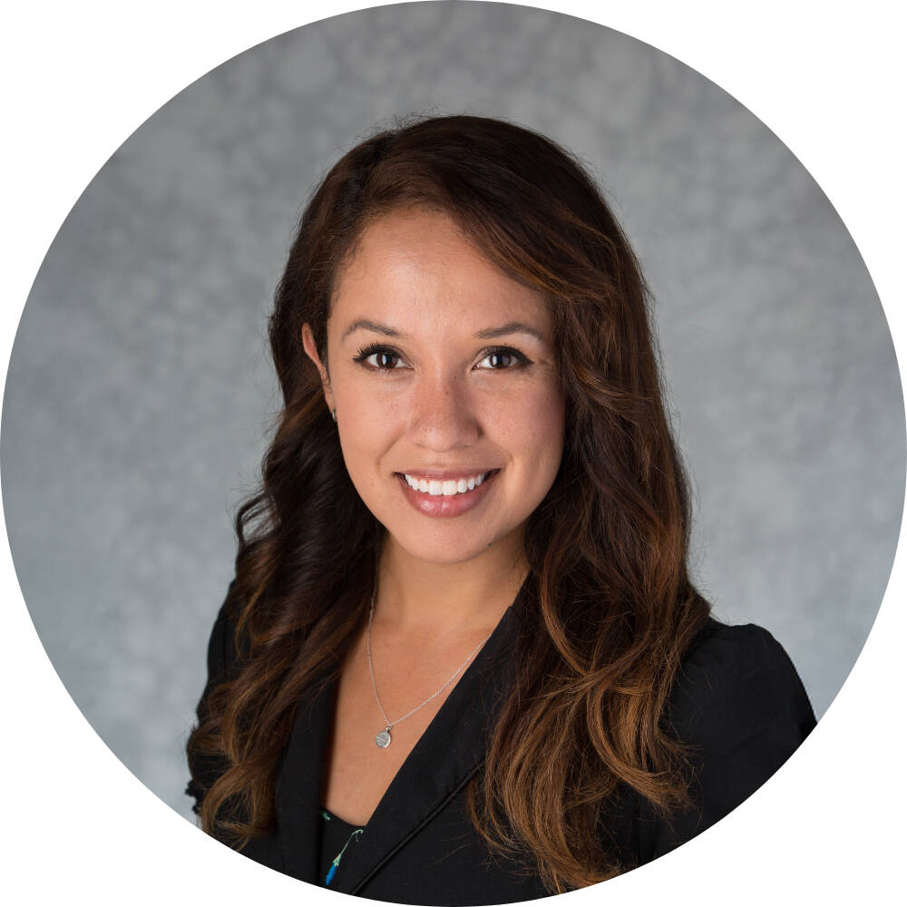 Elisa Ortega-Schultz smiling for her GVSU headshot